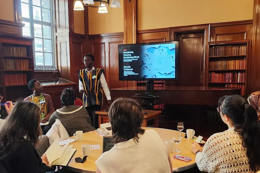 Charlie Cobbinah presenting his research to a seminar audience